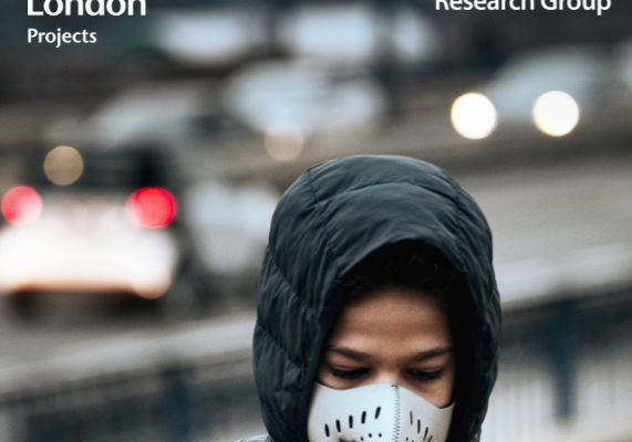 Person in a jacket with a white mask